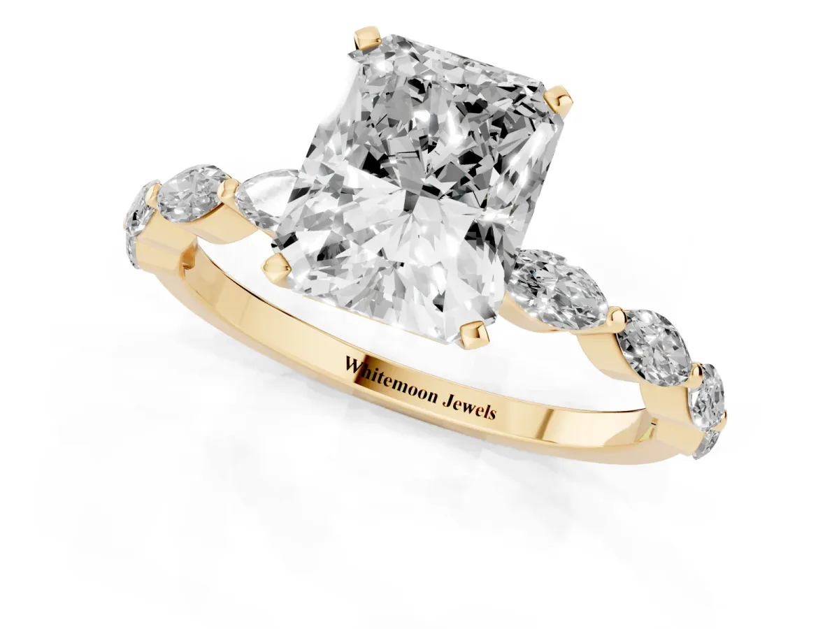 Radiant Cut Diamond Ring with Marquise Side Stones and Prong Setting Yellow gold