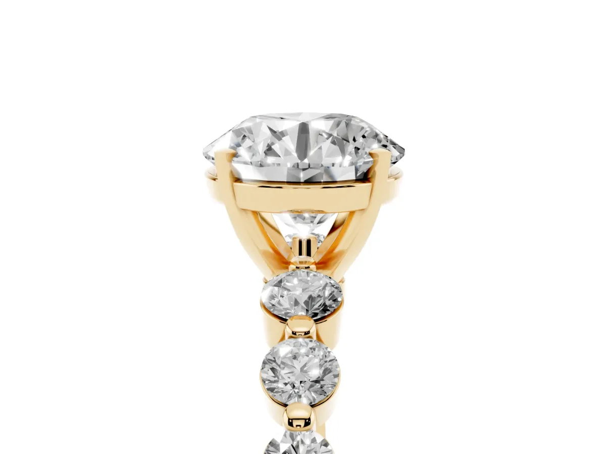 Round Cut Solitaire Diamond Ring with Pave Band and Four-Prong Setting Yellow gold