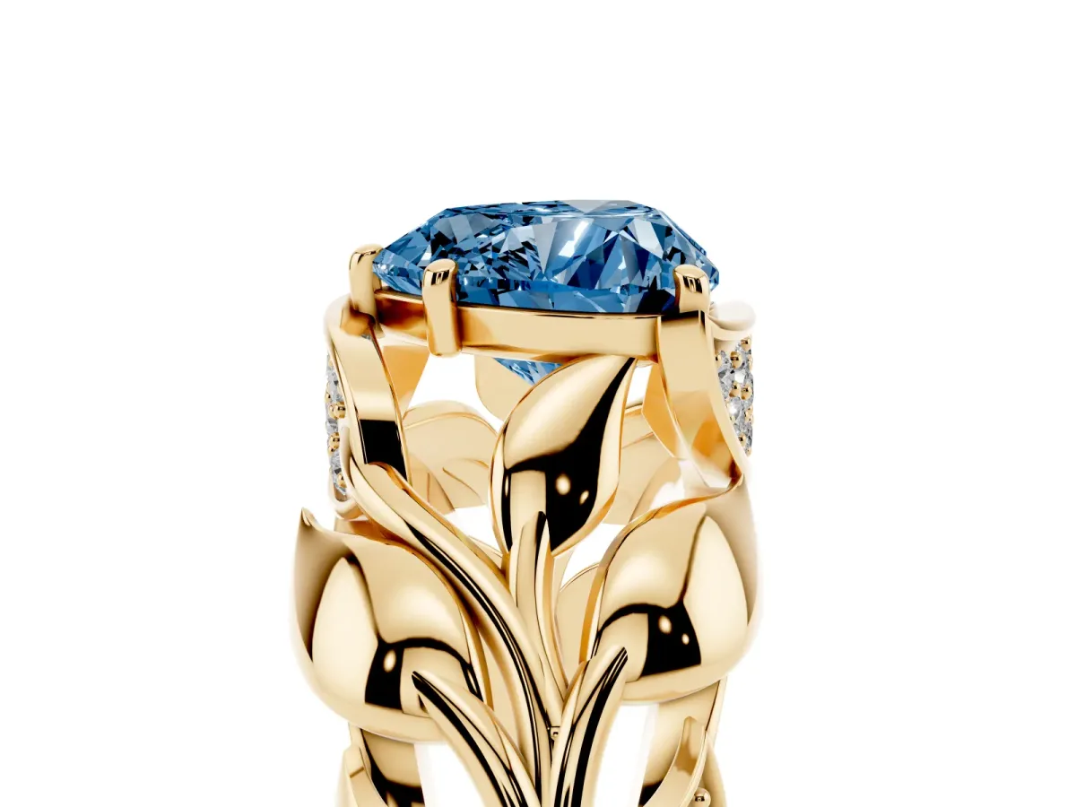 Fancy Blue Heart Cut Diamond Leaf-Inspired Engagement Ring with Round Accents and Prong Setting Yellow gold