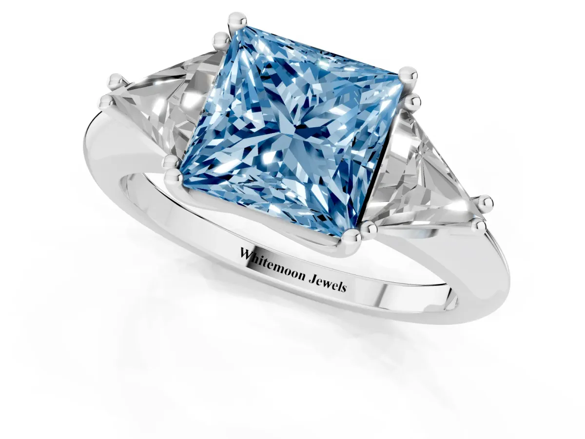 Fancy Blue Three-Stone Princess Cut Diamond Engagement Ring with Trillion Side Stones and Prong Setting Silver