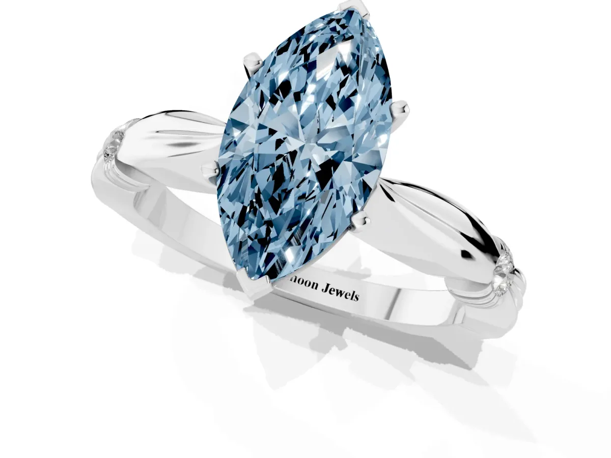 Fancy Blue Marquise Cut Solitaire Diamond Twisted Band with Four-Prong Setting Silver