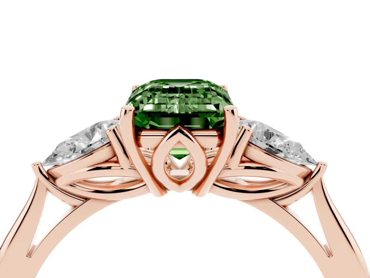 Fancy Green Three-Stone Emerald Cut Diamond Ring with Pear Side Stones in Four-Prong Setting Rose gold