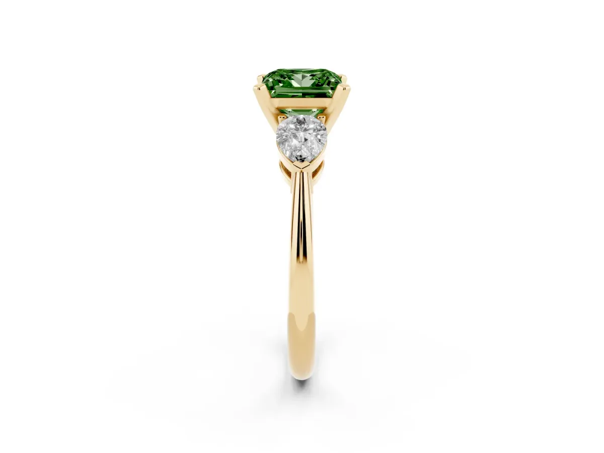 Fancy Green Three-Stone Princess Cut Diamond Ring with Pear Side Stones and Four-Prong Setting Yellow gold
