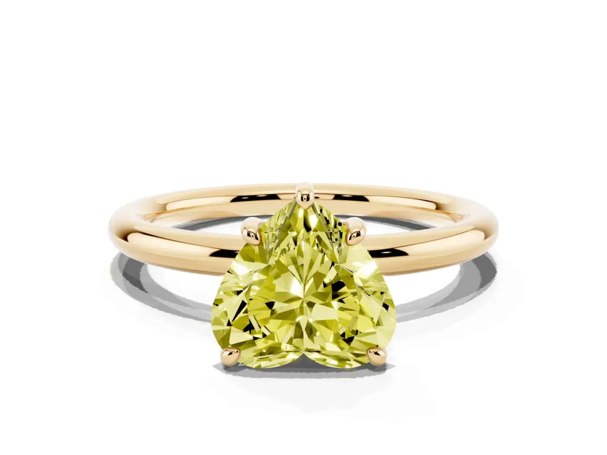 Fancy Yellow Heart Cut Solitaire Diamond Ring with Four-Prong Setting on a Plain Band Yellow gold