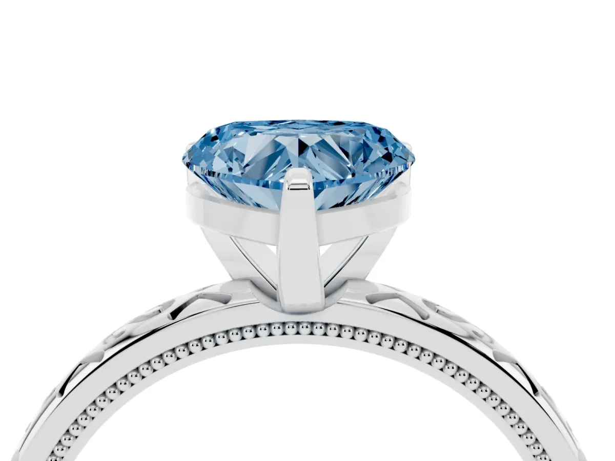 Fancy Blue Heart Cut Solitaire Engagement Ring with Scrollwork Band and Four-Prong Setting White gold