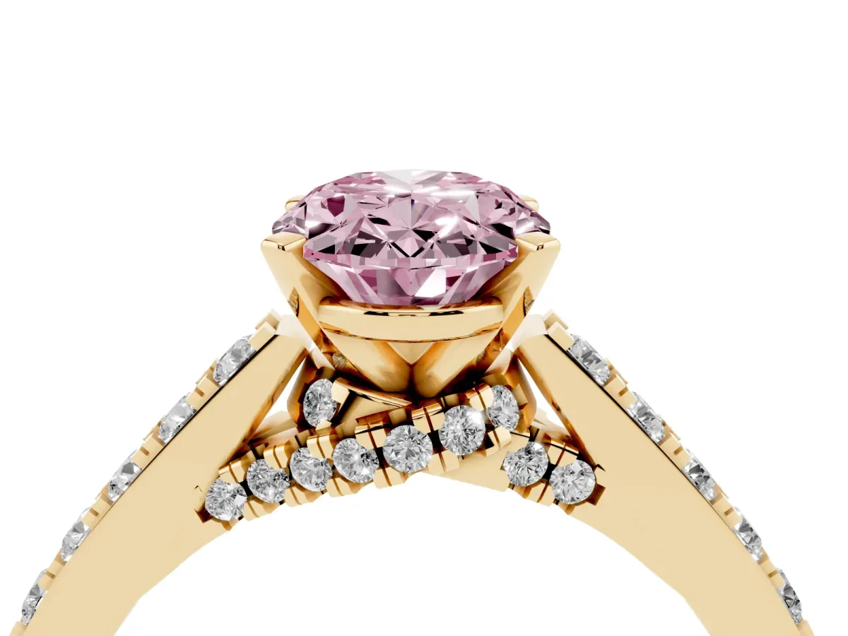 Fancy Pink Oval Cut Diamond Solitaire Ring with Crossover Gallery and Round Pavé Band Yellow gold