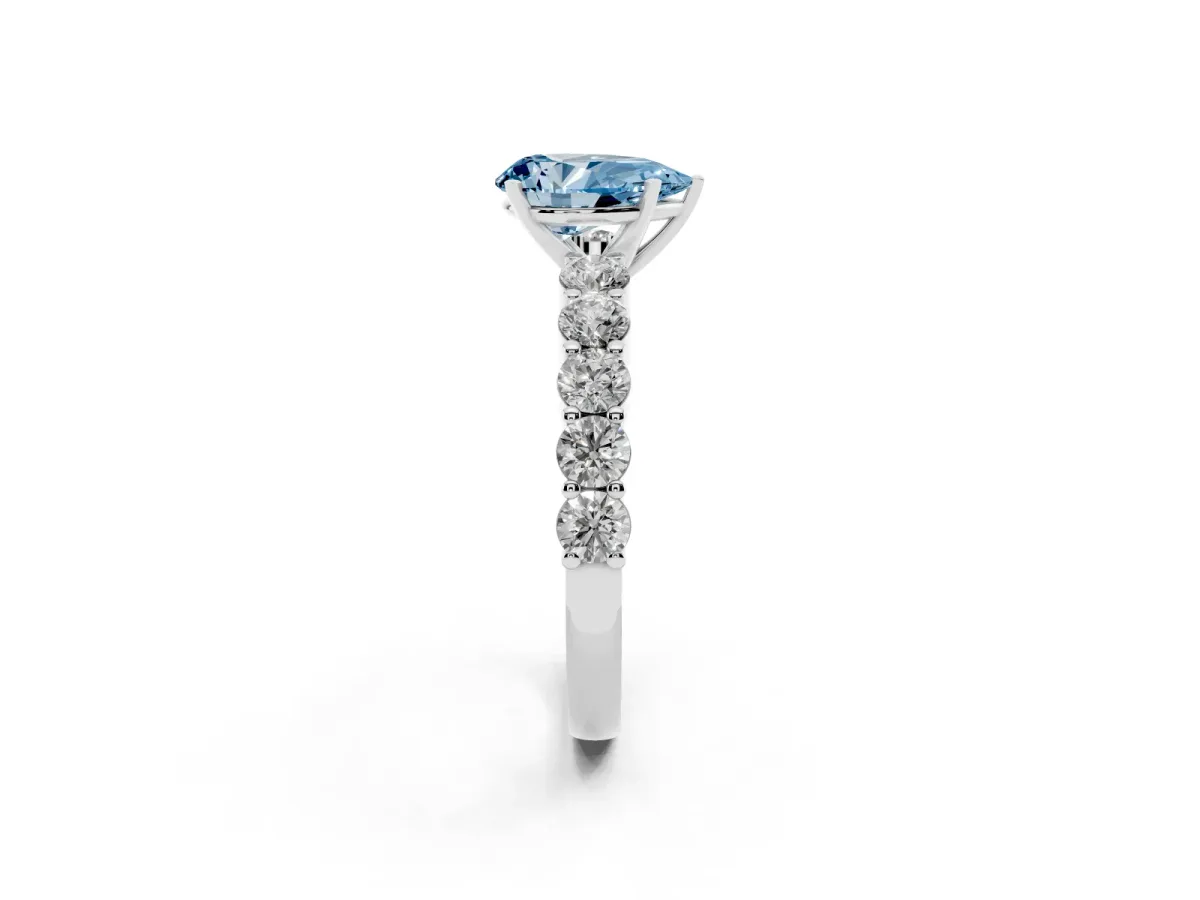Fancy Blue Pear Cut Diamond Solitaire Ring with Shared Prong Round Side Stones Platinum