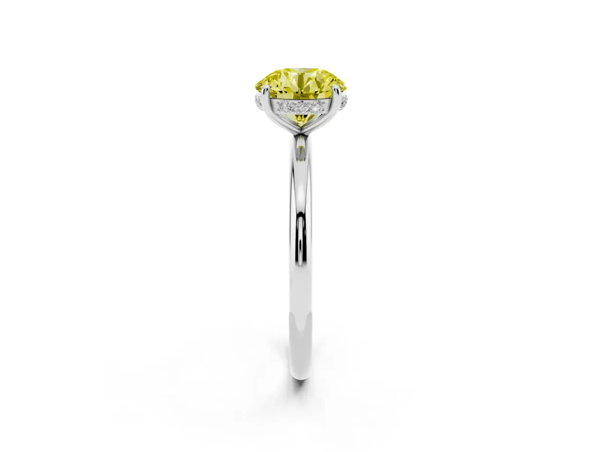 Fancy Yellow Round Cut Solitaire Diamond Ring with a Classic Band and Four-Prong Setting Silver