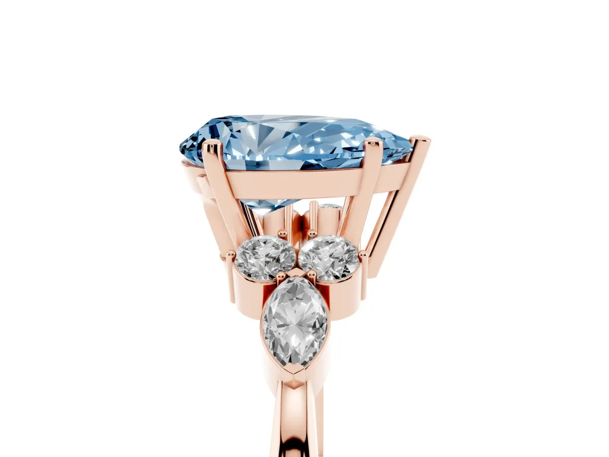 Fancy Blue Pear Cut Brilliant Diamond Solitaire Ring with Pear Side Stones and Four-Prong Setting Rose gold