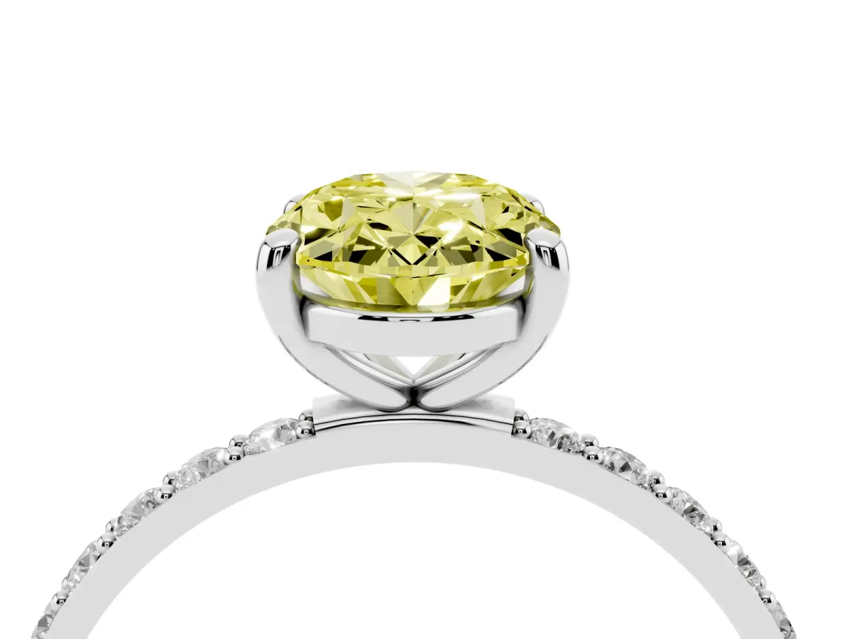 Fancy Yellow Oval Cut Diamond Solitaire Ring with Round Pavé Band and Prong Setting Platinum
