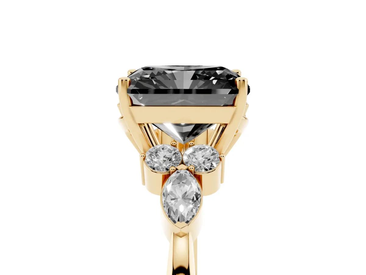 Fancy Black Radiant Cut Brilliant Diamond Solitaire Ring with Pear Side Stones and Four-Prong Setting Yellow gold