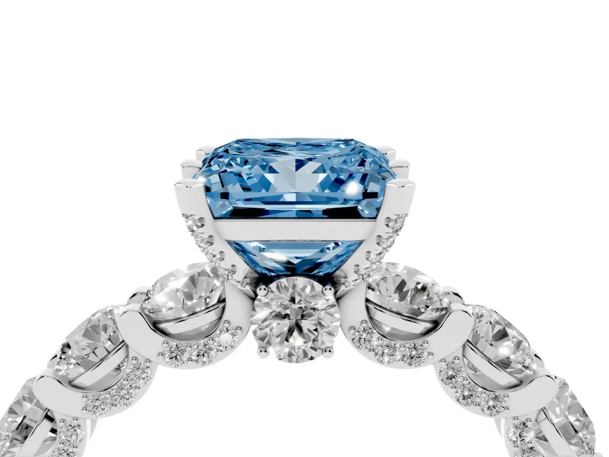 Fancy Blue Princess Cut Diamond Side Stone Engagement Ring with Four-Prong Setting Platinum