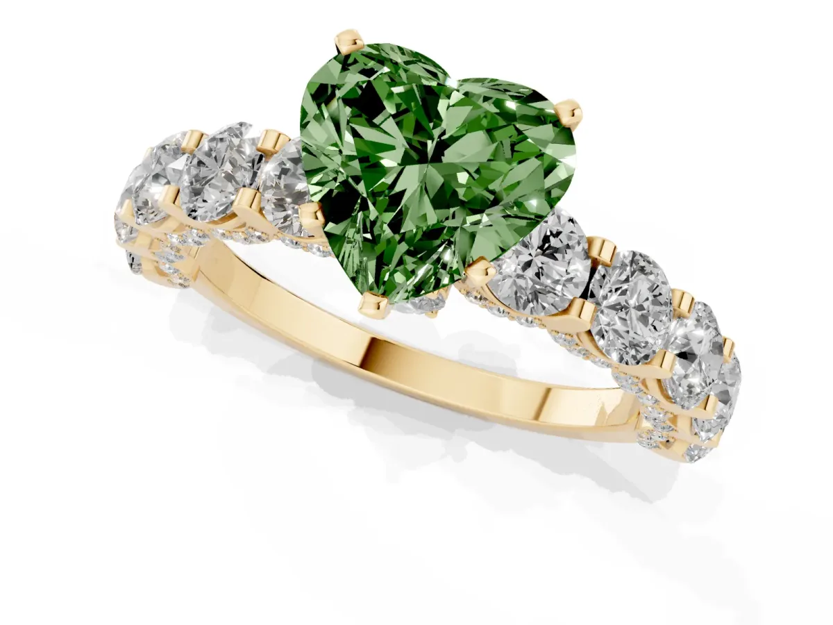 Fancy Green Heart Cut Diamond Side Stone Engagement Ring with Four-Prong Setting Yellow gold