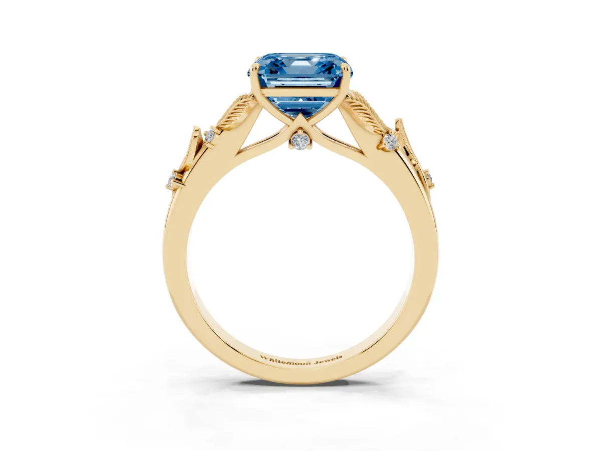 Fancy Blue Asscher Cut Diamond Solitaire Ring with Leaf Motif Band and Four-Prong Setting Yellow gold