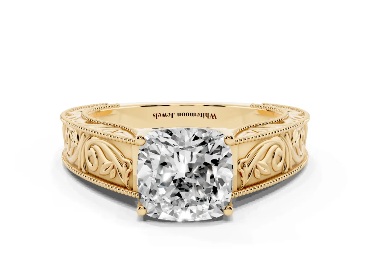 Cushion Cut Diamond Solitaire Ring with Engraved Band and Four-Prong Setting Yellow gold