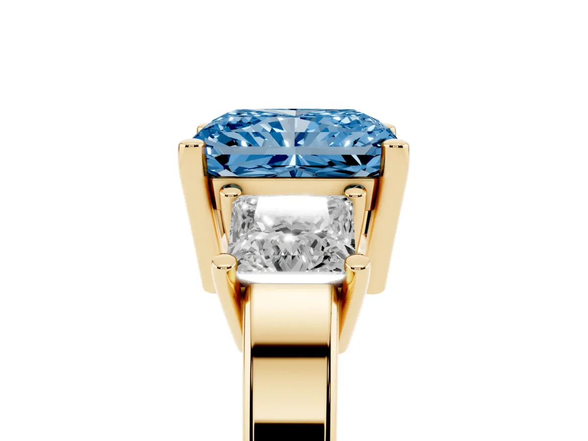 Fancy Blue Three-Stone Radiant Cut Cut Solitaire Ring with Prong Setting Yellow gold