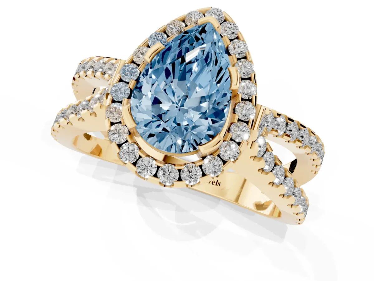 Fancy Blue Pear Cut Diamond Halo Ring with Split Shank Pavé Band and Prong Setting Yellow gold