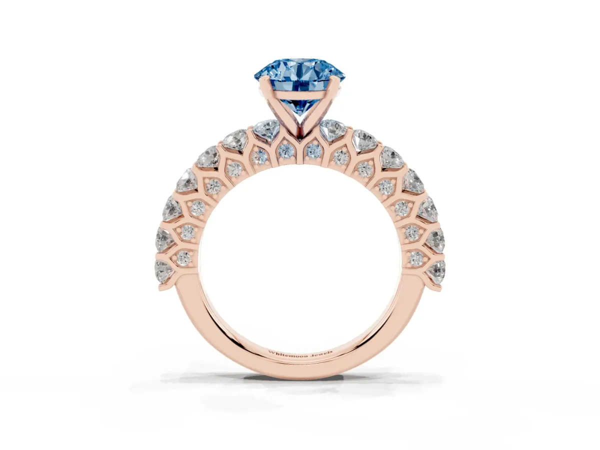 Fancy Blue Round Cut Diamond Solitaire Ring with Shared Prong Pavé Band and Four-Prong Setting Rose gold