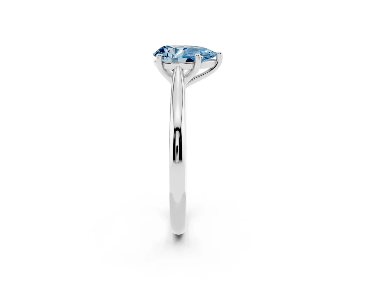 Fancy Blue Pear Cut Cut Solitaire Ring with Cathedral Band and Four-Prong Setting Silver