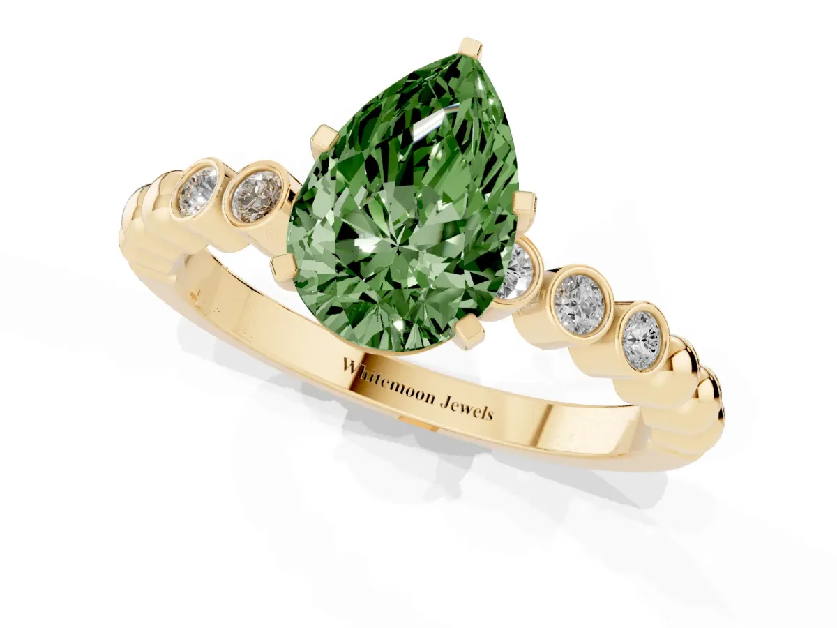 Fancy Green Pear Cut Solitaire Bezel Accent Diamond Engagement Ring with Beaded Band and Four-Prong Setting Yellow gold