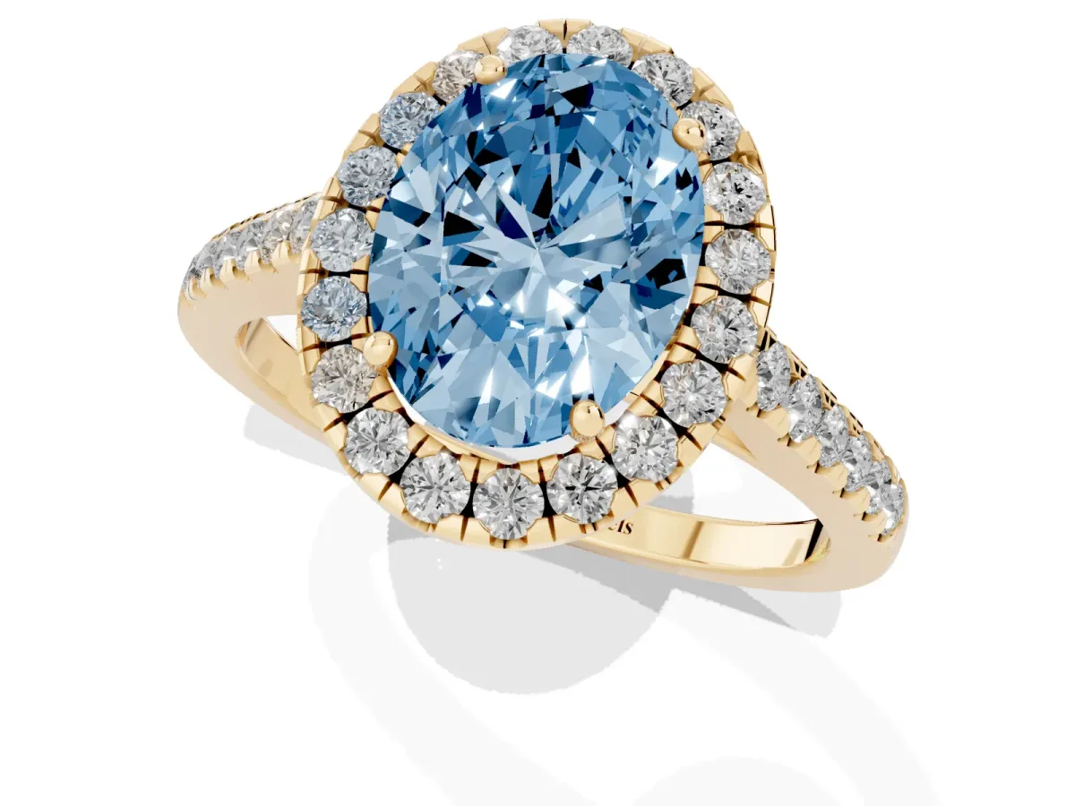 Fancy Blue Oval Cut Halo Pave Diamond Engagement Ring with Four-Prong Setting Yellow gold