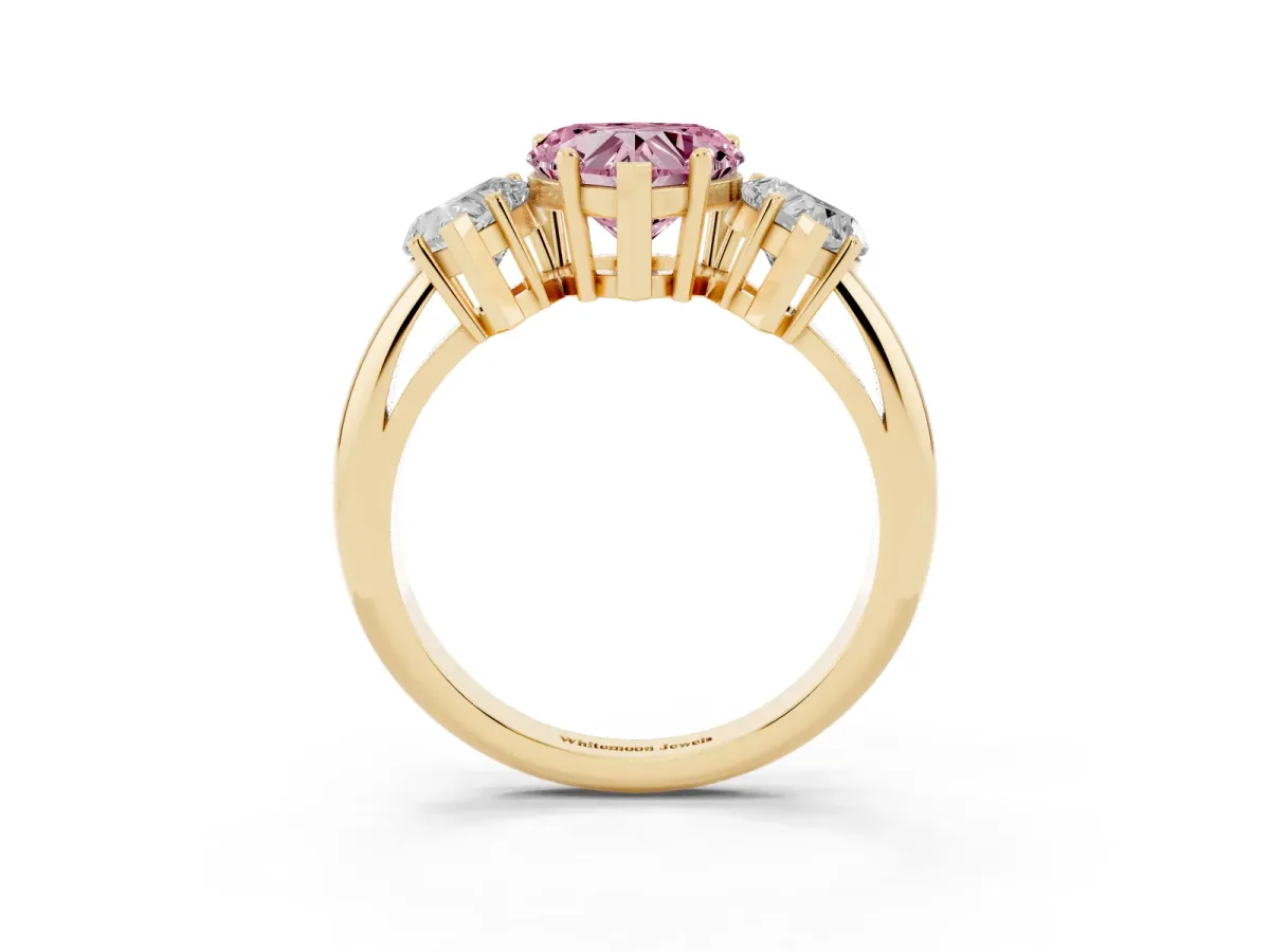 Fancy Pink Three-Stone Heart Cut Cut Diamond Engagement Ring with Prong Setting on a White Gold Band Yellow gold