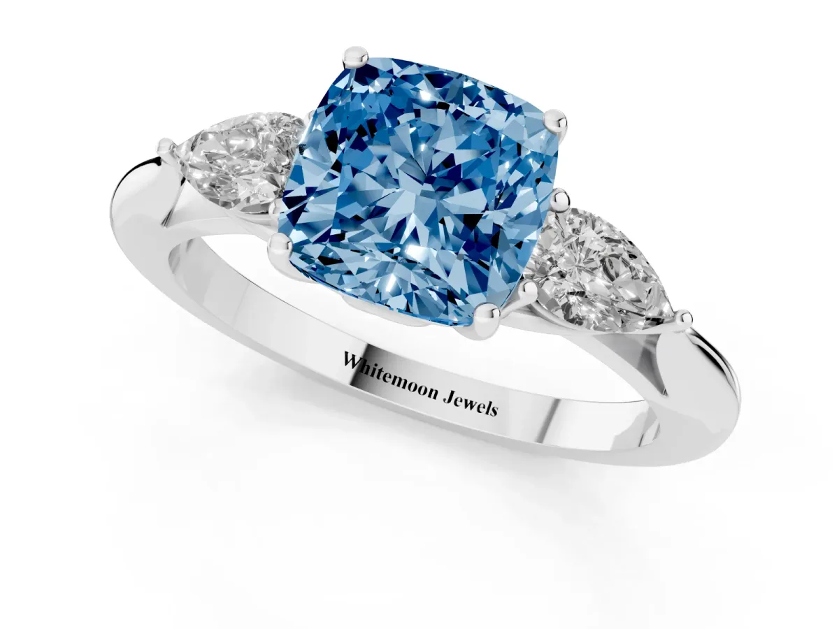 Fancy Blue Cushion Cut Diamond Three-Stone Ring with Pear Side Stones and Prong Setting Silver