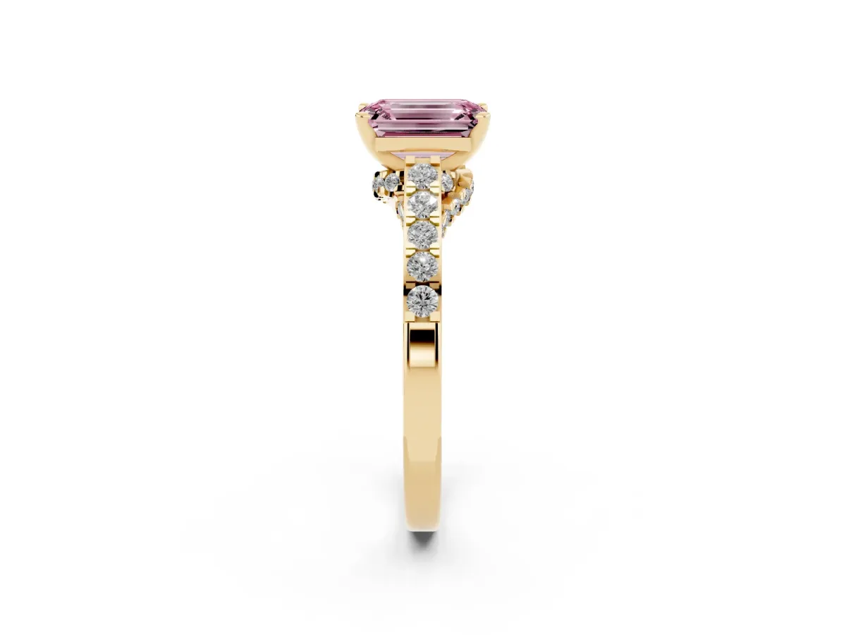 Fancy Pink Emerald Cut Diamond Solitaire Ring with Crossover Gallery and Round Pavé Band Yellow gold