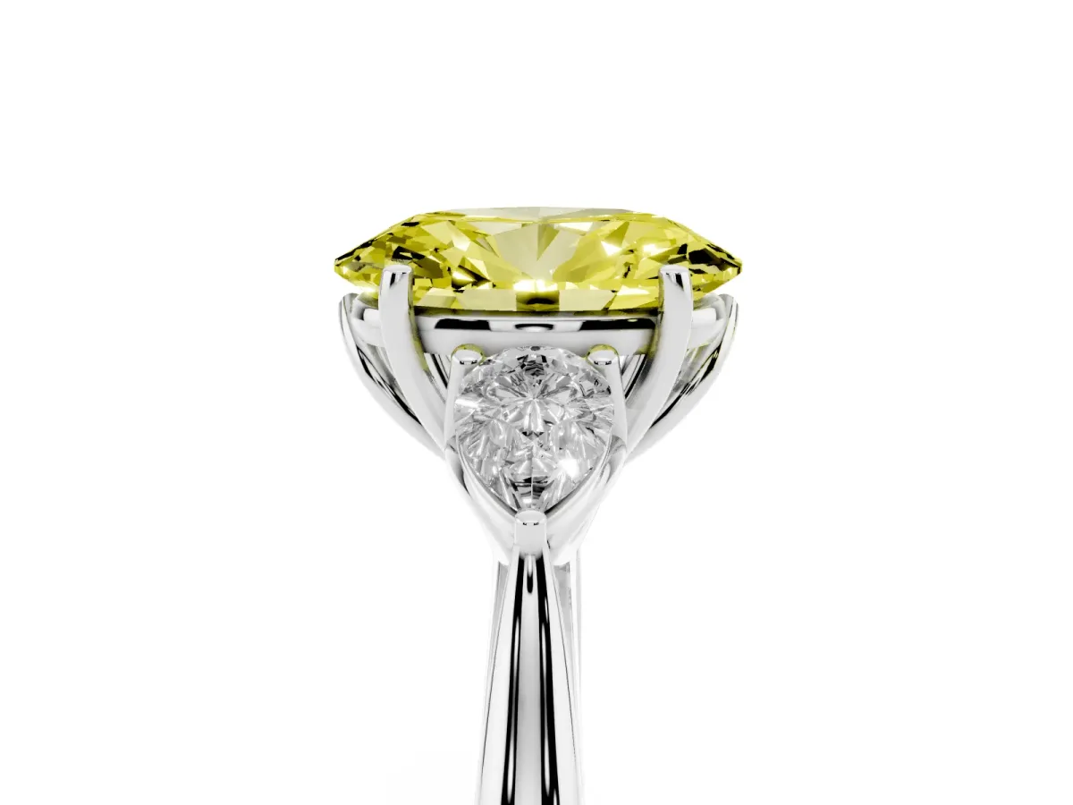 Fancy Yellow Three-Stone Oval Cut Diamond Ring with Pear Side Stones in Four-Prong Setting Silver
