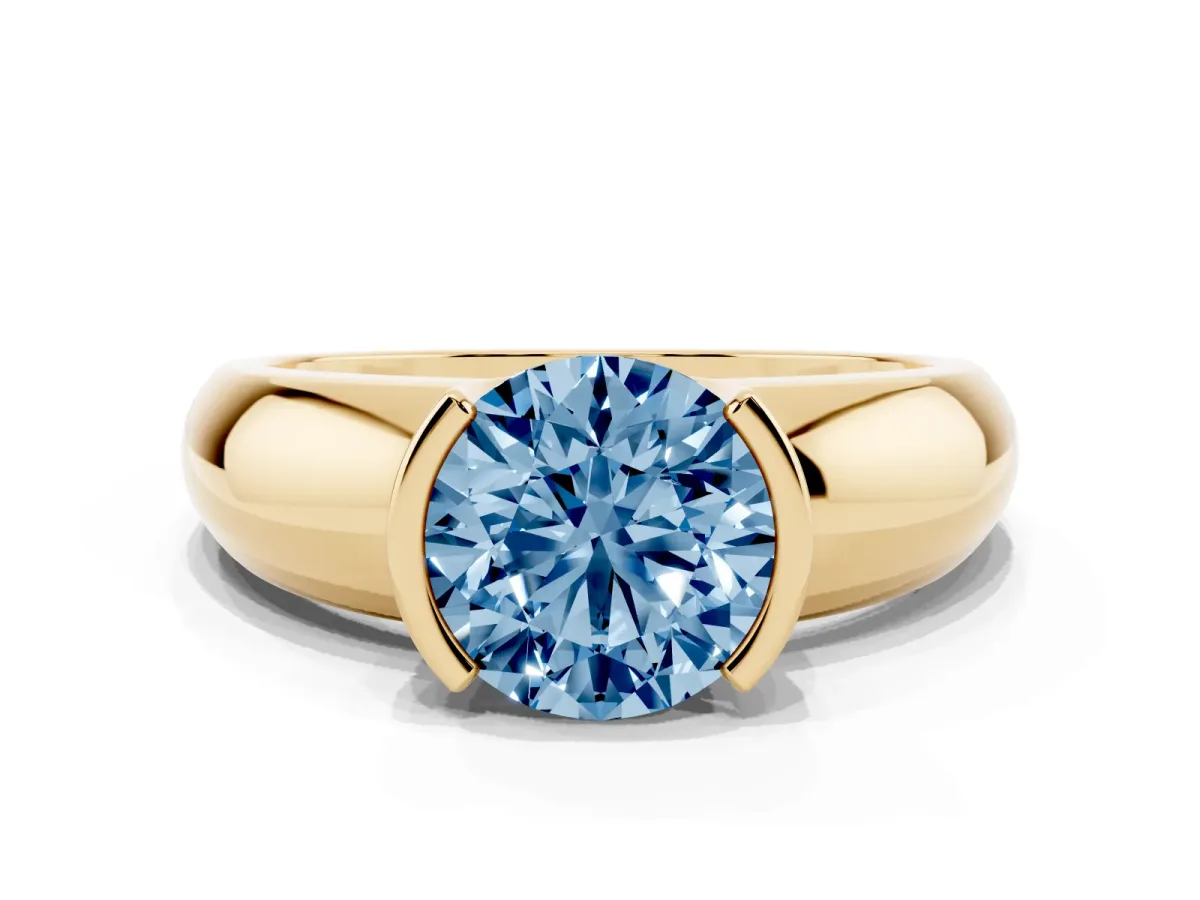 Fancy Blue Round Cut Solitaire Tension Set Diamond Ring with Wide Band Yellow gold