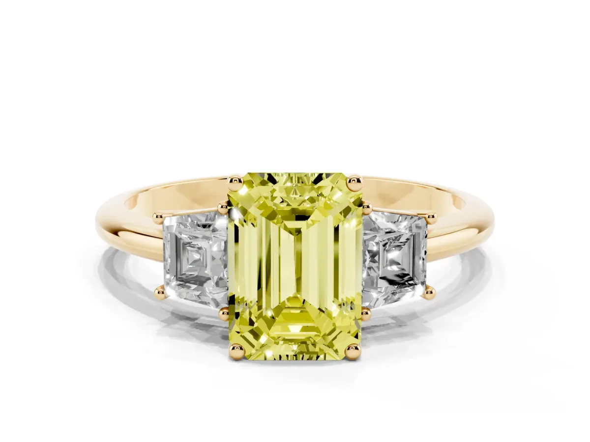 Fancy Yellow Emerald Cut Diamond Three-Stone Ring with Trapezoid Side Stones and Prong Setting Yellow gold