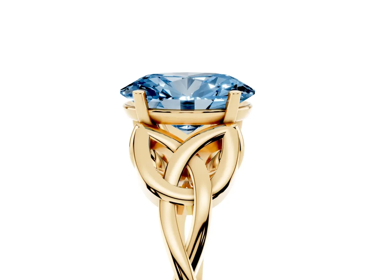 Fancy Blue Oval Cut Diamond Solitaire Engagement Ring with Celtic Knot Band and Four-Prong Setting Yellow gold