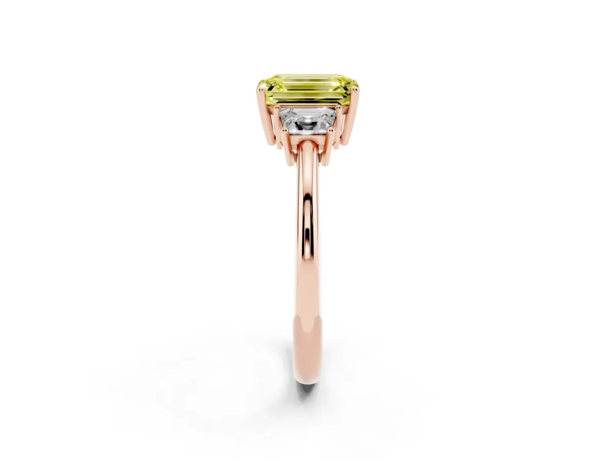 Fancy Yellow Emerald Cut Diamond Three-Stone Ring with Trapezoid Side Stones and Prong Setting Rose gold