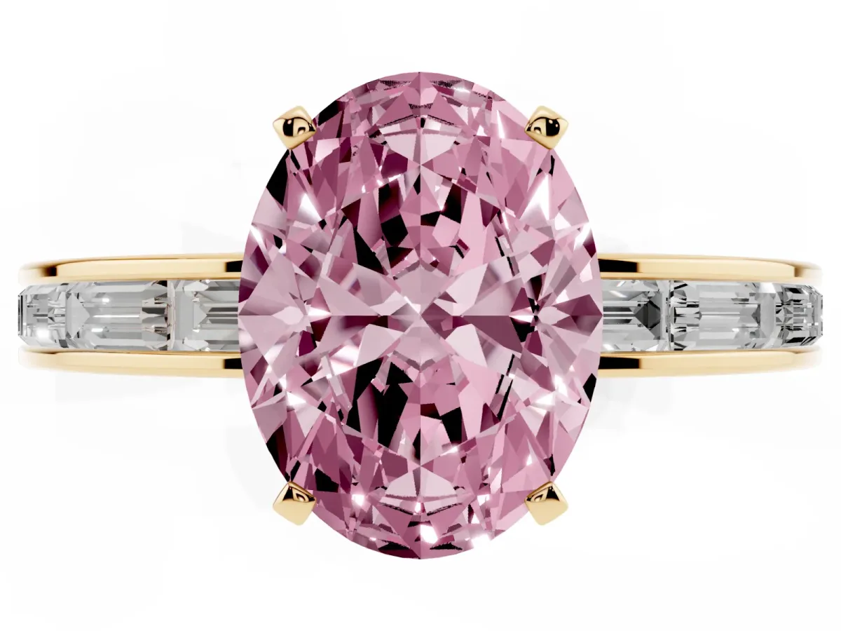 Fancy Pink Oval Cut Solitaire Diamond Ring with Channel-Set Baguette Band and Four-Prong Setting Yellow gold