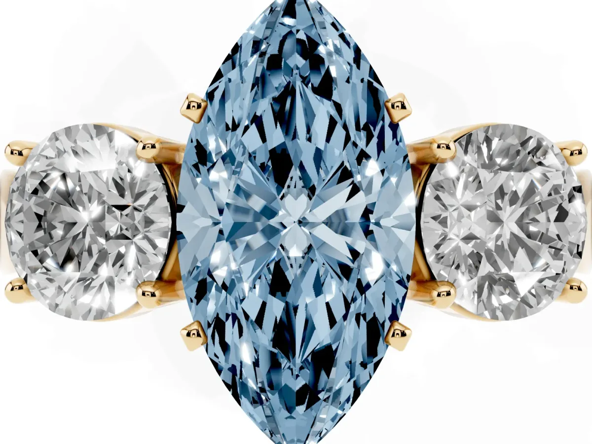 Fancy Blue Three-Stone Marquise Cut Diamond Ring with Round Side Stones, Classic Band, and Four-Prong Setting Yellow gold