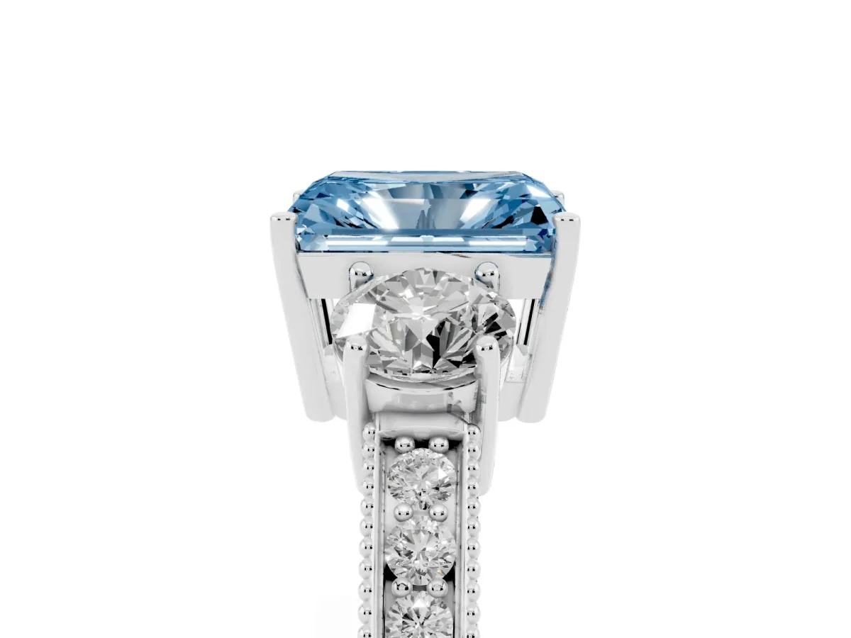 Fancy Blue Radiant Cut Three-Stone Diamond Ring with Pavé Band and Four-Prong Setting Silver