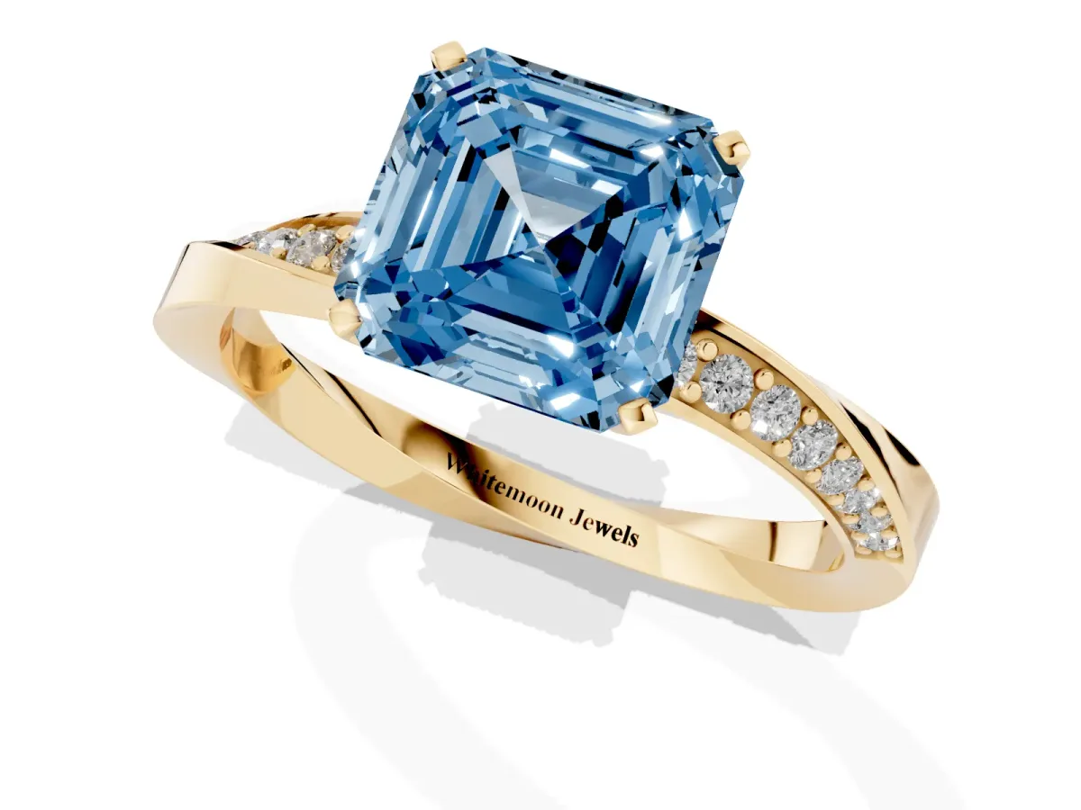 Fancy Blue Asscher Cut Diamond Engagement Ring with Side Stone Accents and Four-Prong Setting Yellow gold