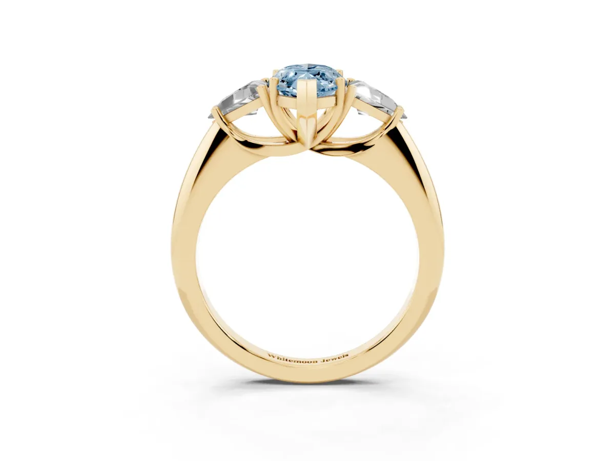 Fancy Blue Three-Stone Marquise Cut Diamond Engagement Ring with Trillion Side Stones and Prong Setting Yellow gold