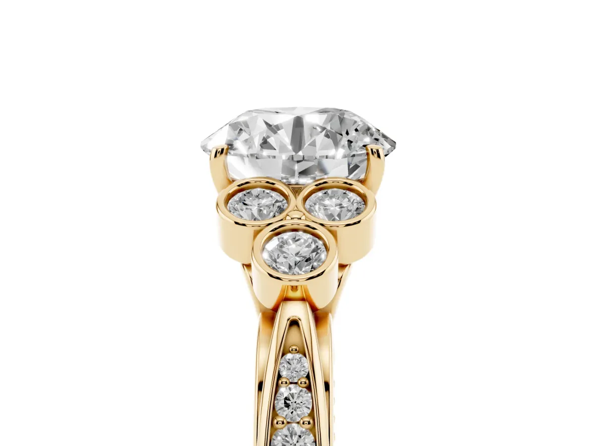 Round Cut Cut Diamond Engagement Ring with Bezel Set Round Side Stones and Prong Setting Yellow gold