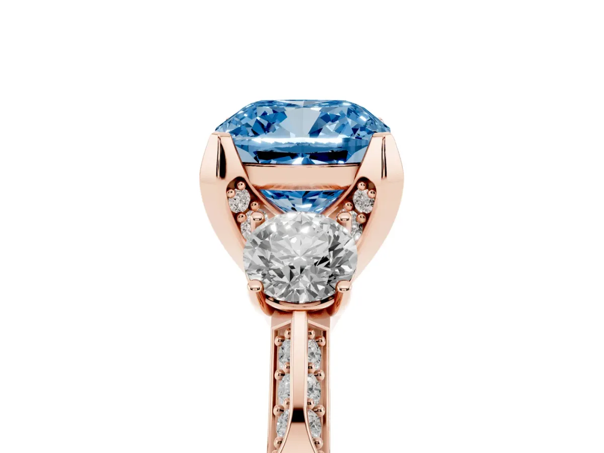 Fancy Blue Cushion Cut Brilliant Three-Stone Diamond Ring with Pavé Band and Four-Prong Setting Rose gold