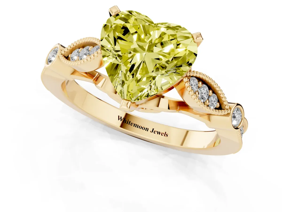 Fancy Yellow Heart Cut Cut Diamond with Milgrain Marquise and Bezel Accents on a Solitaire Band with Prong Setting Yellow gold