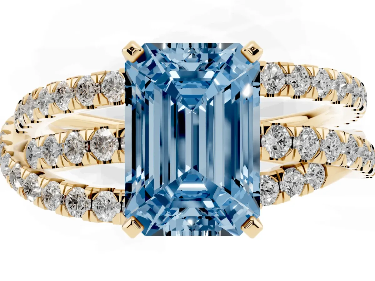 Fancy Blue Emerald Cut Solitaire Twist Band with Pavé Setting and Four-Prong Setting Yellow gold