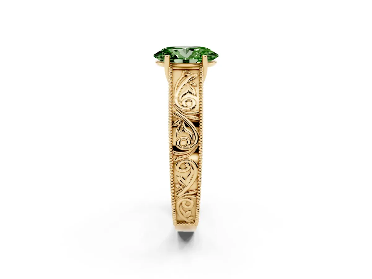 Fancy Green Oval Cut Diamond Solitaire Ring with Engraved Band and Four-Prong Setting Yellow gold