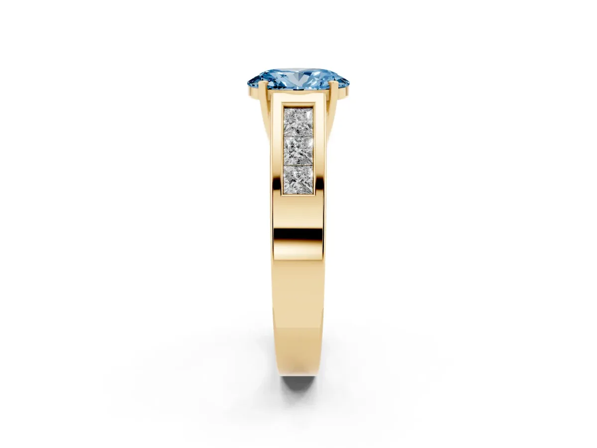 Fancy Blue Oval Cut Cut Channel Set Solitaire Ring with Four-Prong Setting Yellow gold