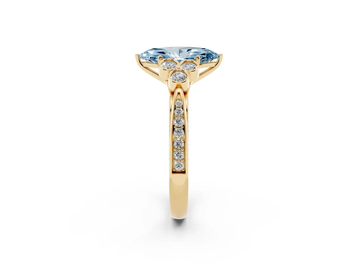Fancy Blue Marquise Cut Cut Diamond Engagement Ring with Bezel Set Round Side Stones and Prong Setting Yellow gold