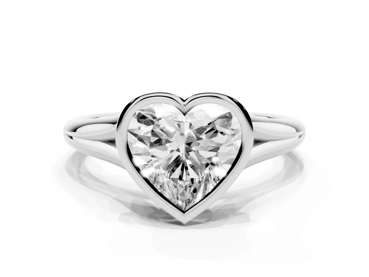 Bezel Set Heart Cut Cut Solitaire Ring with Tapered Band Silver