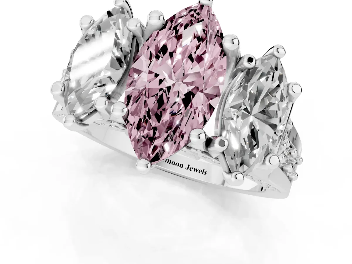 Fancy Pink Marquise Cut Diamond Three-Stone Ring with Channel Set Band and Four-Prong Setting Platinum