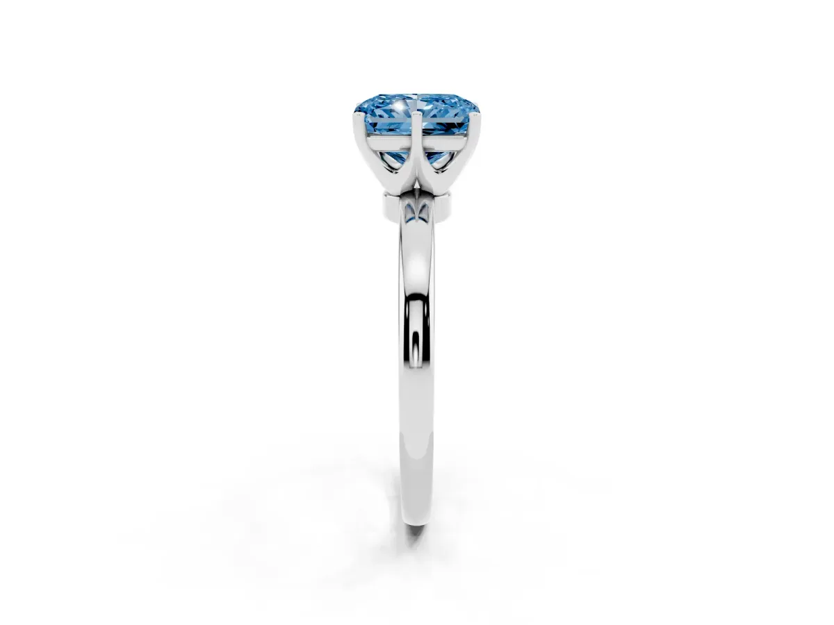 Fancy Blue Radiant Cut Solitaire Diamond Ring with Six-Prong Setting on a Classic Band Silver
