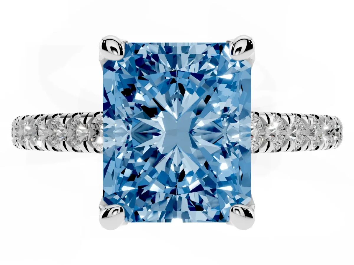 Fancy Blue Radiant Cut Brilliant Diamond Solitaire with Pavé Band and Four-Prong Setting Silver
