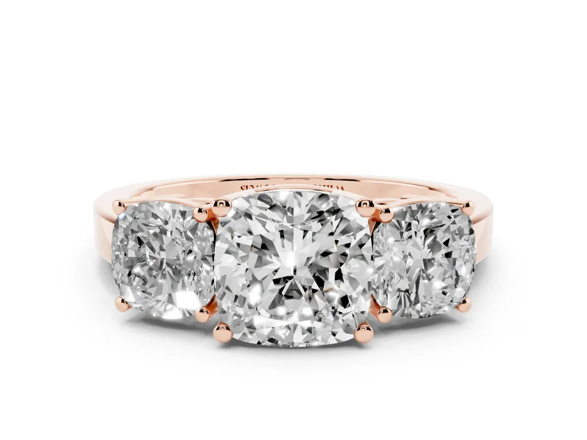 Three-Stone Cushion Cut Cut Diamond Engagement Ring with Flat Band and Four-Prong Setting Rose gold